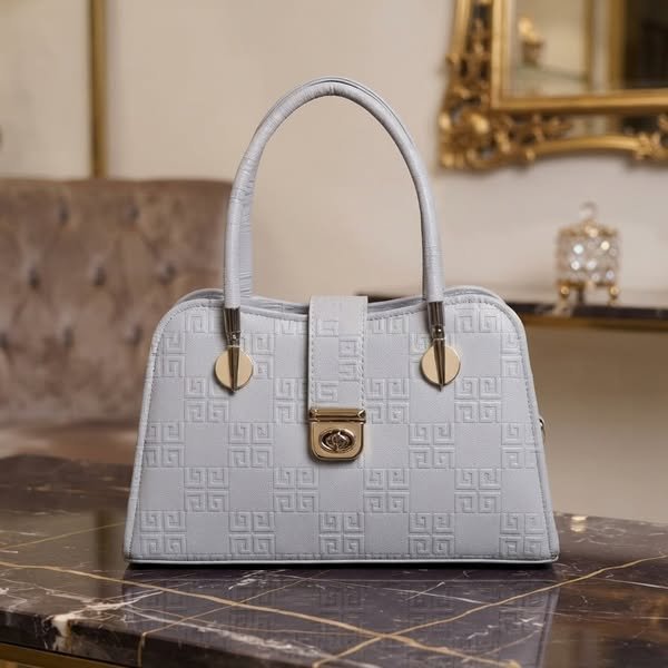Geometric Debossed Powder Blue Trapeze Satchel with Medallion Handles
