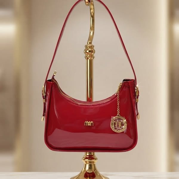 Crescent Moon Glossy Patent Leather Shoulder Bag with Gold Medallion Charm