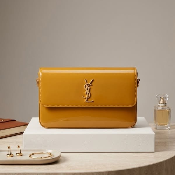 Lustrous Mustard Patent Leather Flap Shoulder Bag with Sculptural Gold Monogram Clasp